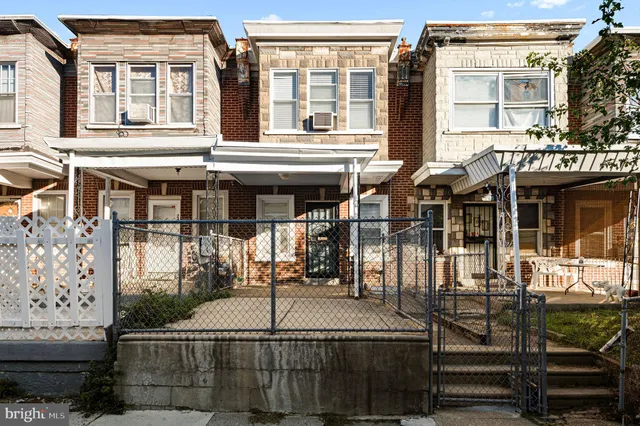 a front view of a house with a entrance