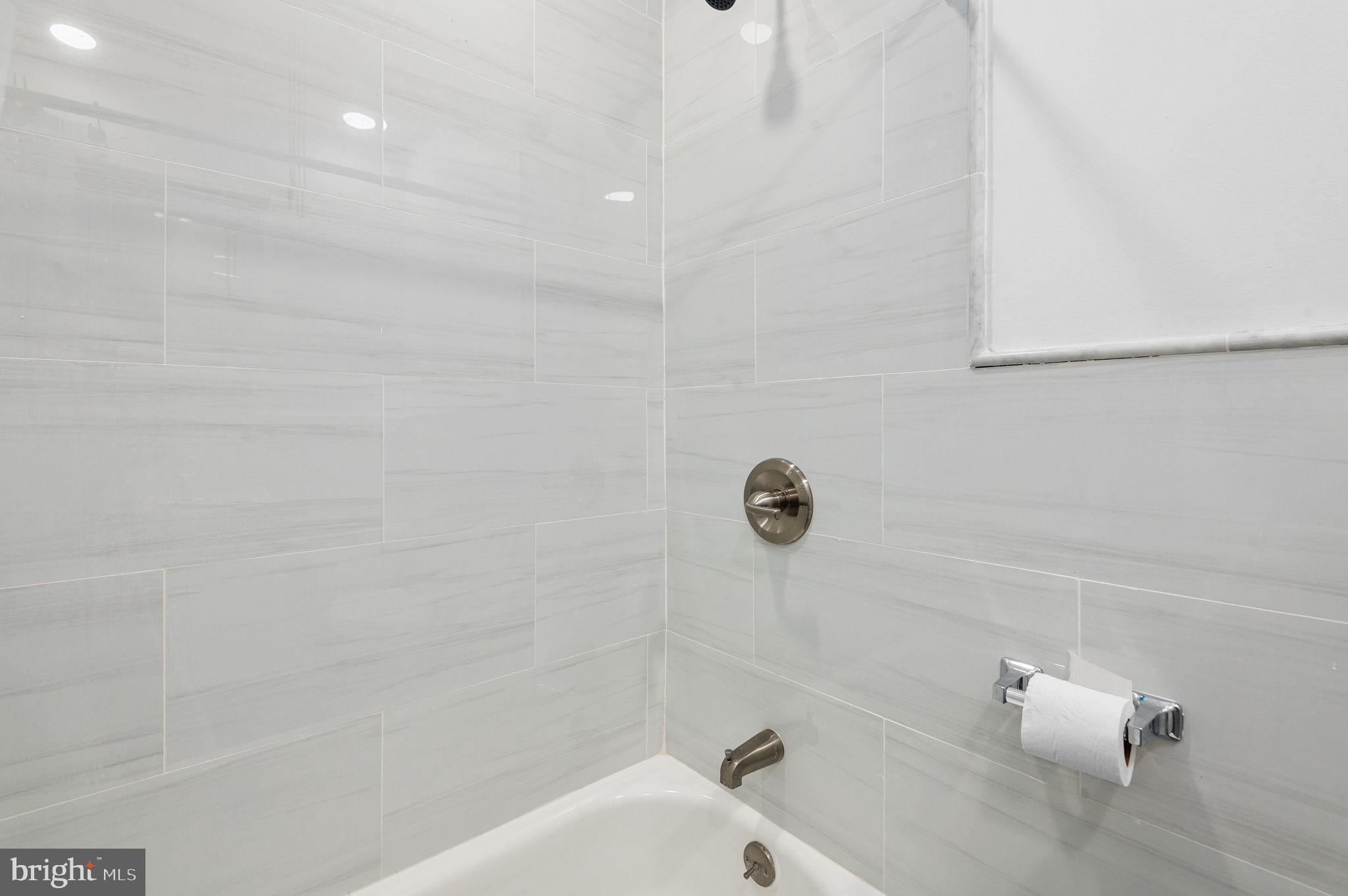 243 East Sheldon Street Philadelphia, PA 19120 - Photo 16 of 23 a bathroom with a bathtub