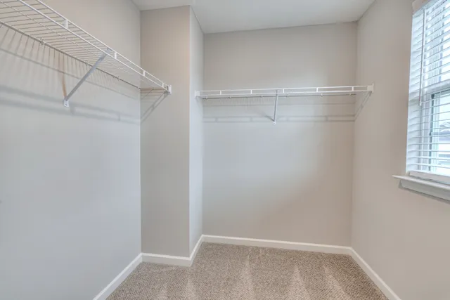 a view of an empty walk in closet