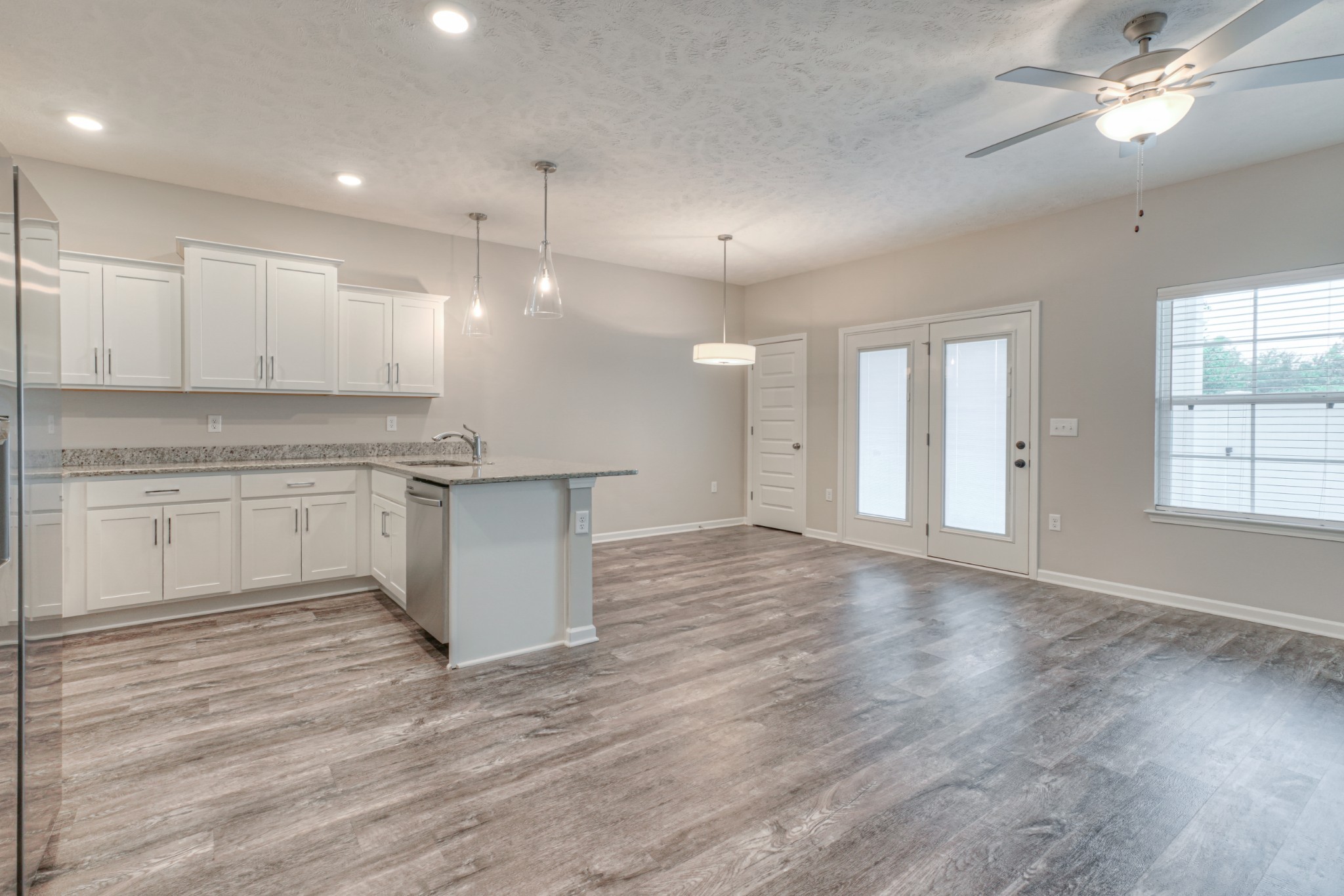 4318 Spyglass Drive Murfreesboro, TN 37127 - Photo 4 of 21 a view of a kitchen with a stove cabinets and wooden floor