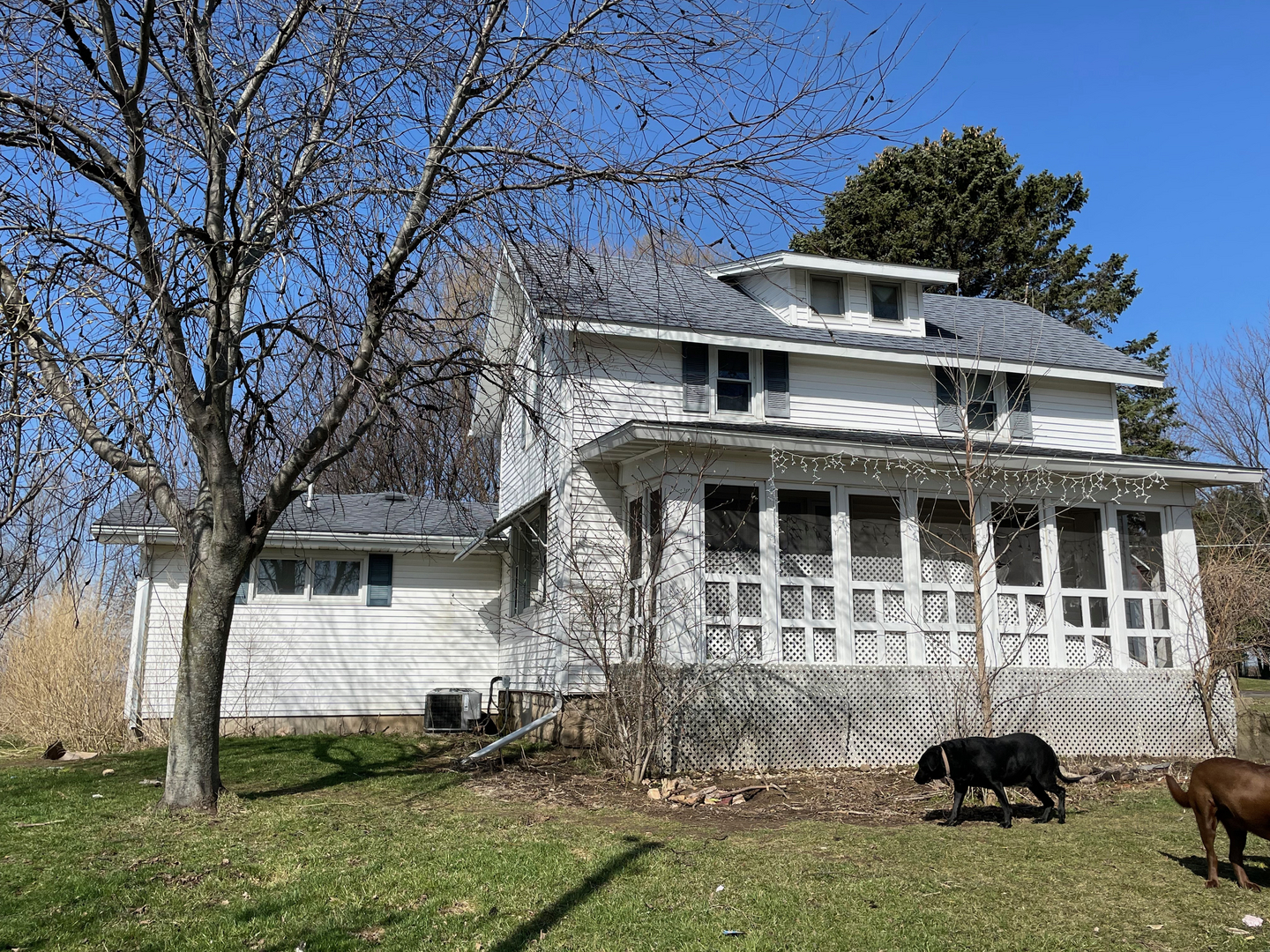 1733 Plock Road Dixon, IL 61021 - Photo 1 of 23 a front view of a house with a yard