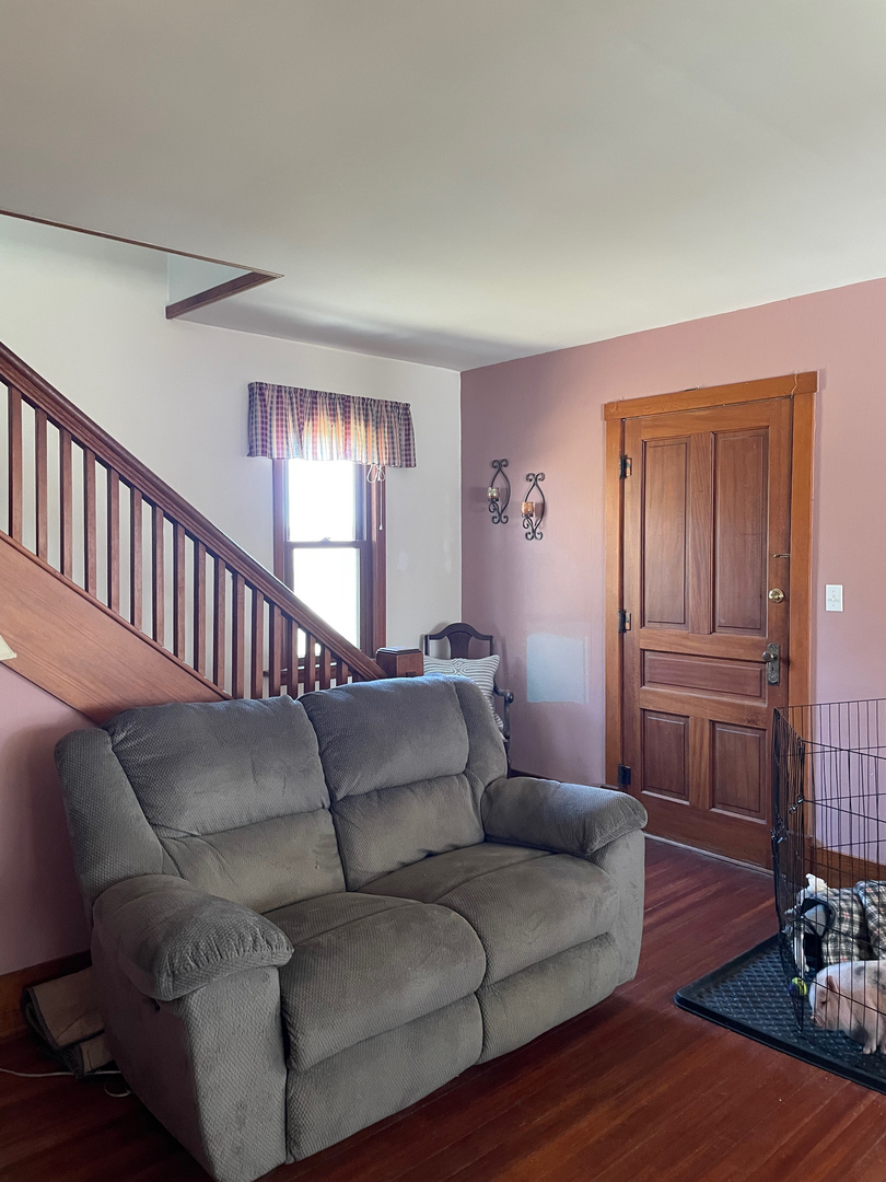 1733 Plock Road Dixon, IL 61021 - Photo 17 of 23 a living room with furniture and wooden floor