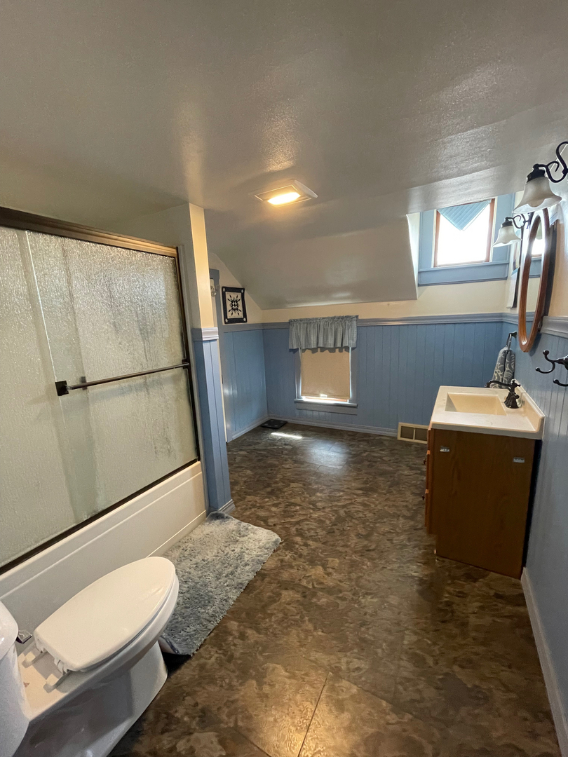 1733 Plock Road Dixon, IL 61021 - Photo 21 of 23 a bathroom with a sink toilet and shower