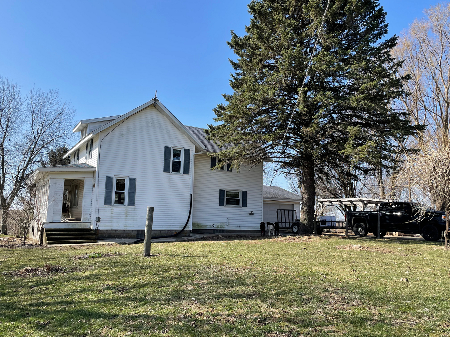1733 Plock Road Dixon, IL 61021 - Photo 3 of 23 a view of a house with a yard