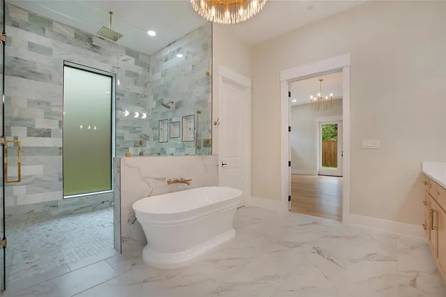 a bathroom with a toilet sink and shower