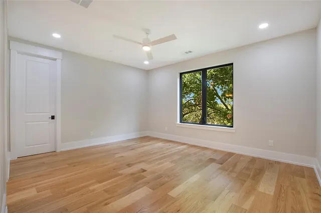 a bathroom with a double vanity sink mirror toilet and bathtub