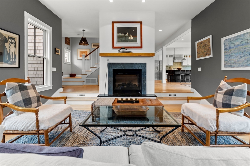 7 Bradlee Road Marblehead, MA 01945 - Photo 12 of 41 a living room with furniture and a fireplace