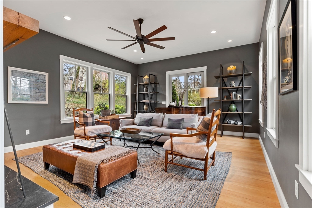 7 Bradlee Road Marblehead, MA 01945 - Photo 13 of 41 a living room with furniture and a book shelf
