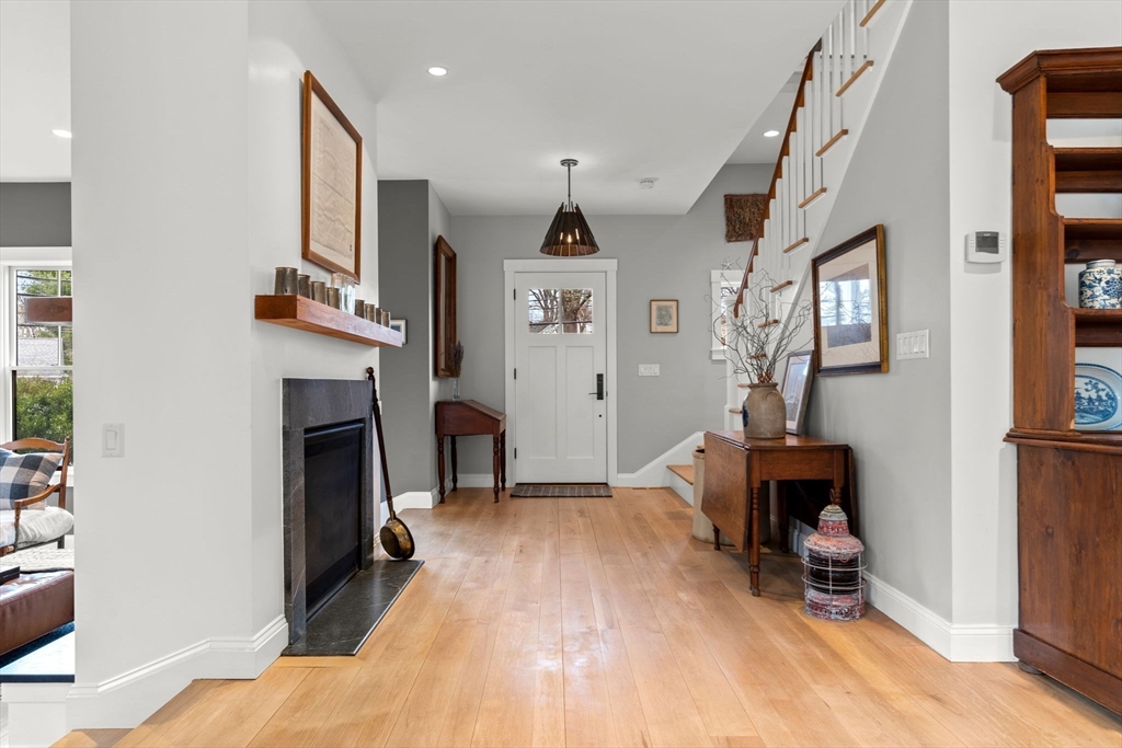7 Bradlee Road Marblehead, MA 01945 - Photo 14 of 41 a living room with furniture and a fireplace