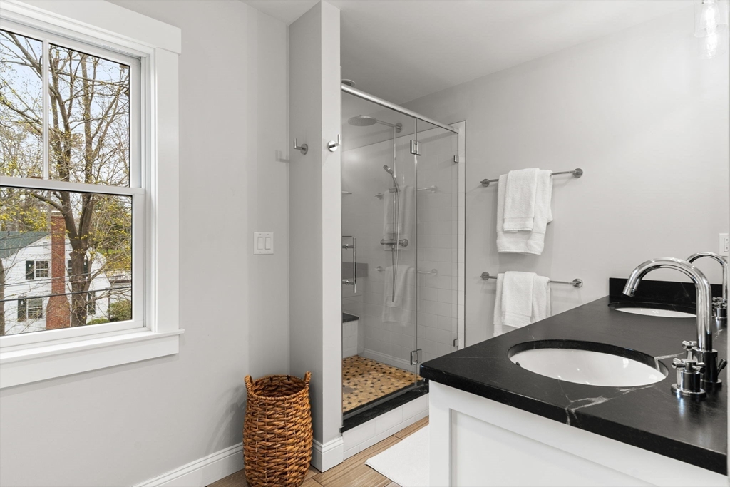 7 Bradlee Road Marblehead, MA 01945 - Photo 21 of 41 a bathroom with a sink and a mirror