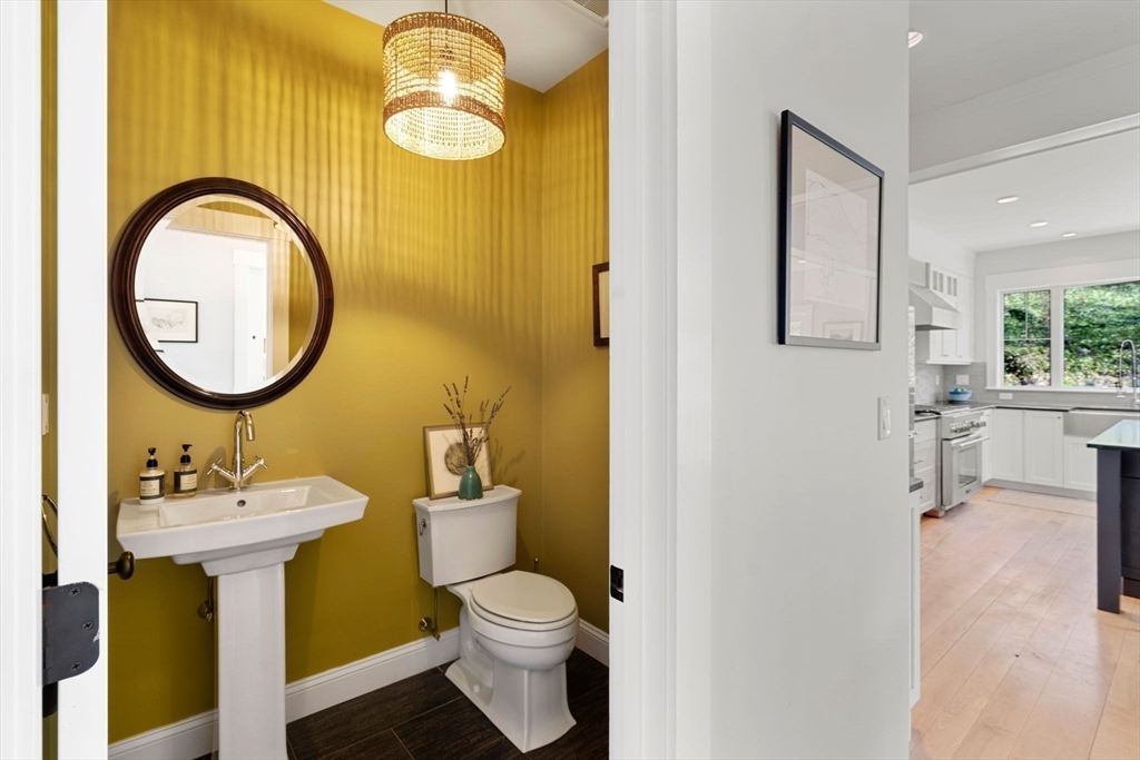 7 Bradlee Road Marblehead, MA 01945 - Photo 33 of 41 a bathroom with a sink mirror and toilet