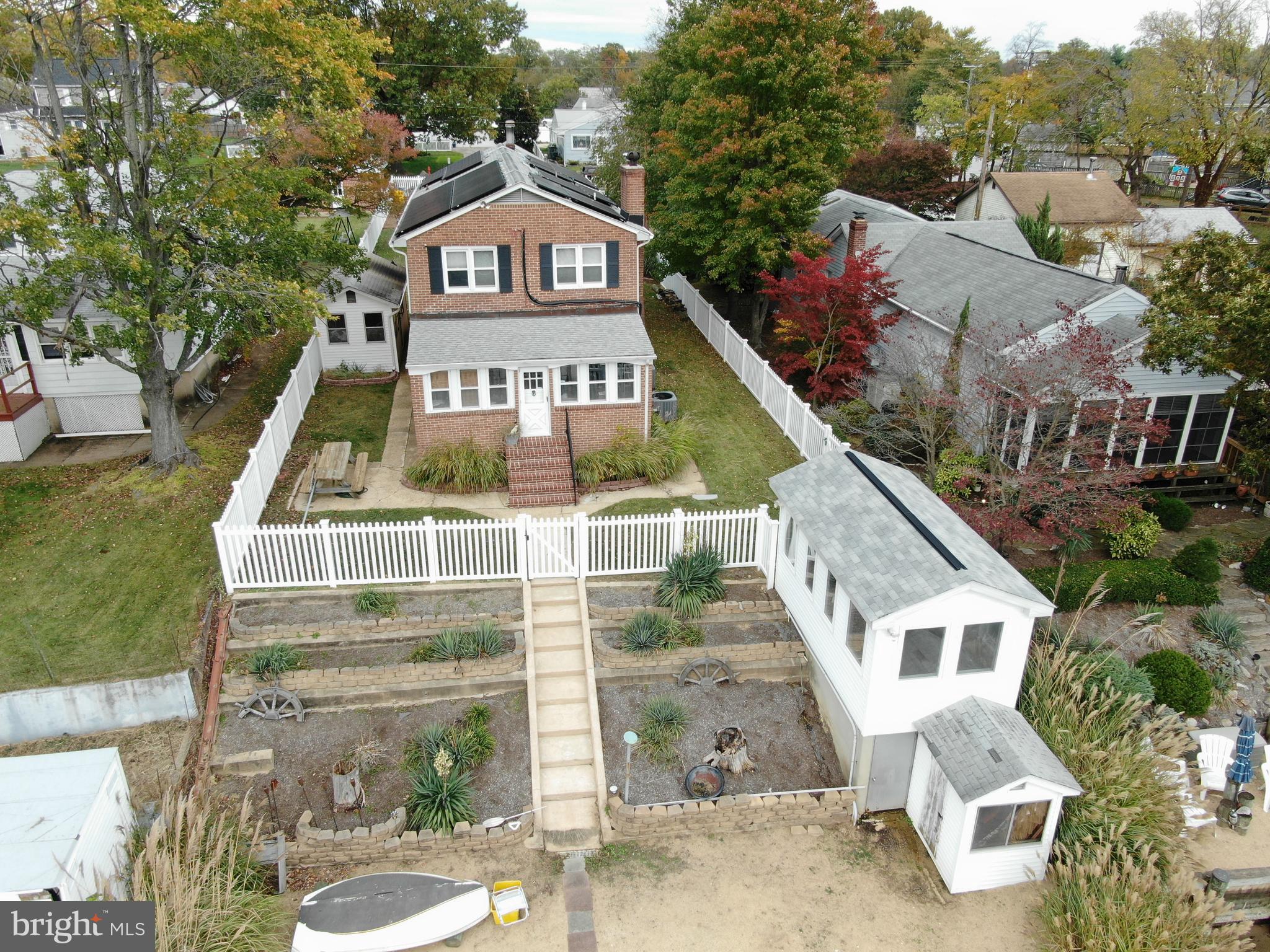 418 Carvel Beach Road Curtis Bay, MD 21226 - Photo 15 of 54 a front view of a house with a yard