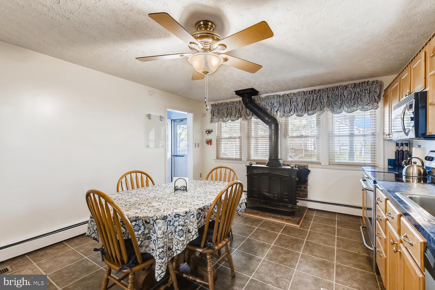 418 Carvel Beach Road Curtis Bay, MD 21226 - Photo 22 of 54 a dining room with furniture and window