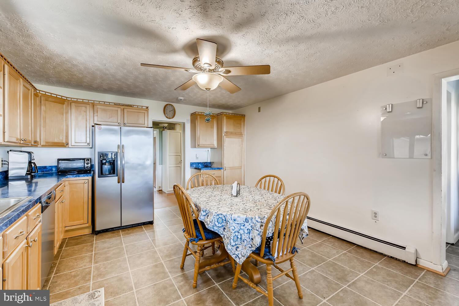 418 Carvel Beach Road Curtis Bay, MD 21226 - Photo 23 of 54 a view of a dining room with furniture