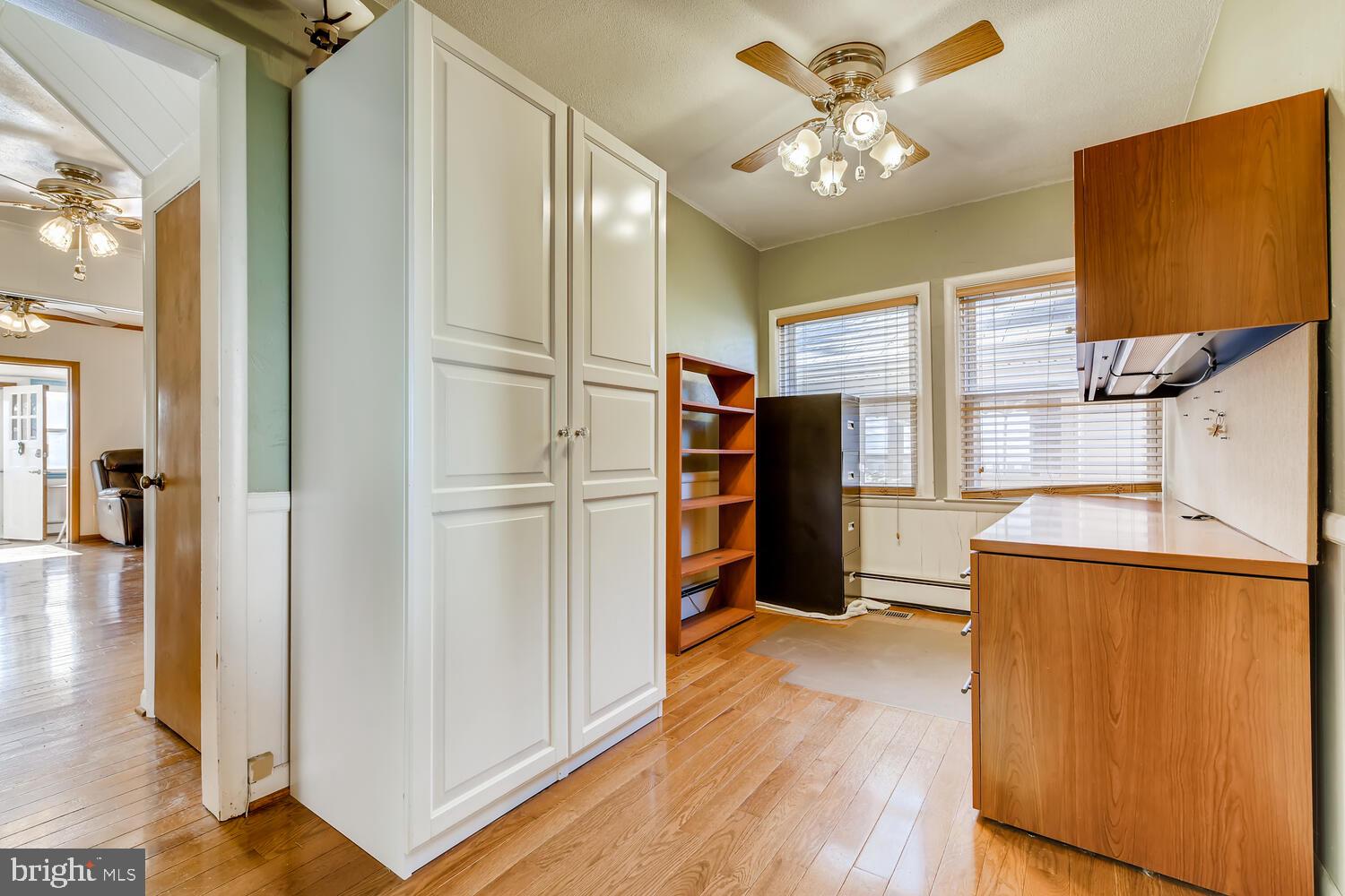 418 Carvel Beach Road Curtis Bay, MD 21226 - Photo 41 of 54 a view of a kitchen with a refrigerator and a stove top oven