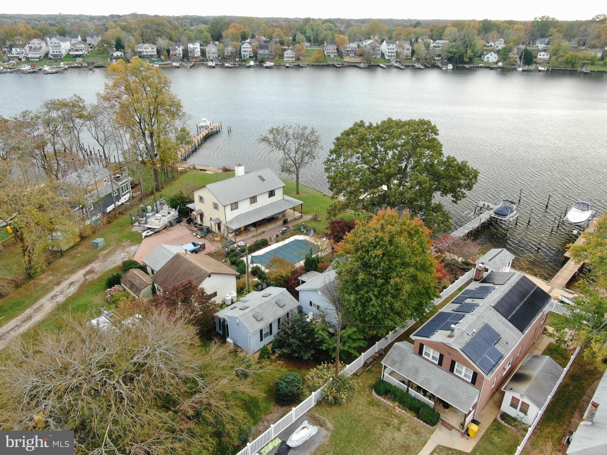 418 Carvel Beach Road Curtis Bay, MD 21226 - Photo 10 of 54 an aerial view of a house with a lake view