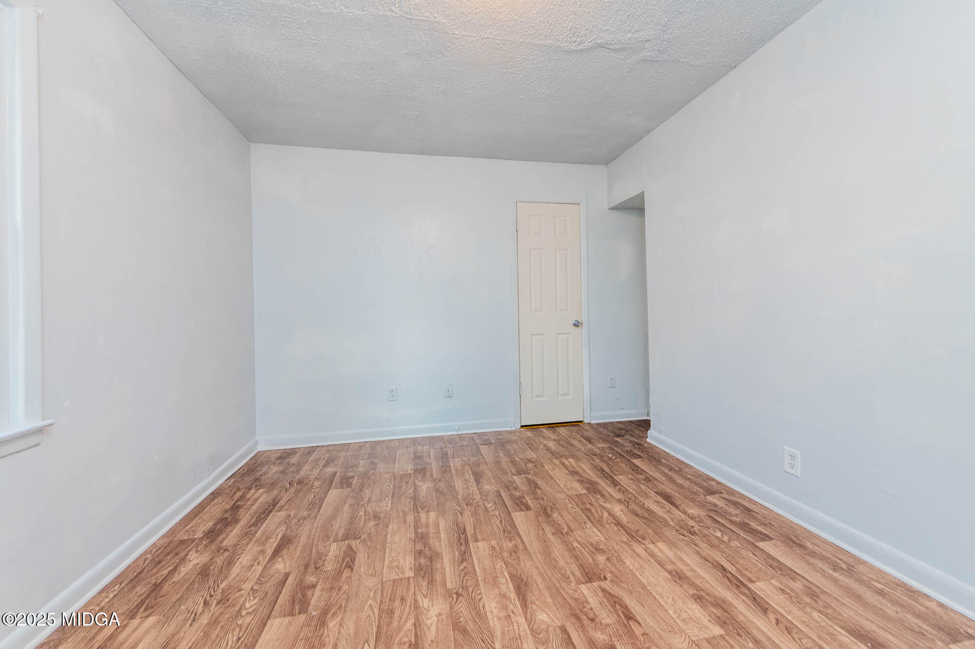 125 Suzanne Drive Warner Robins, GA 31093 - Photo 22 of 50 a view of room with wooden floor