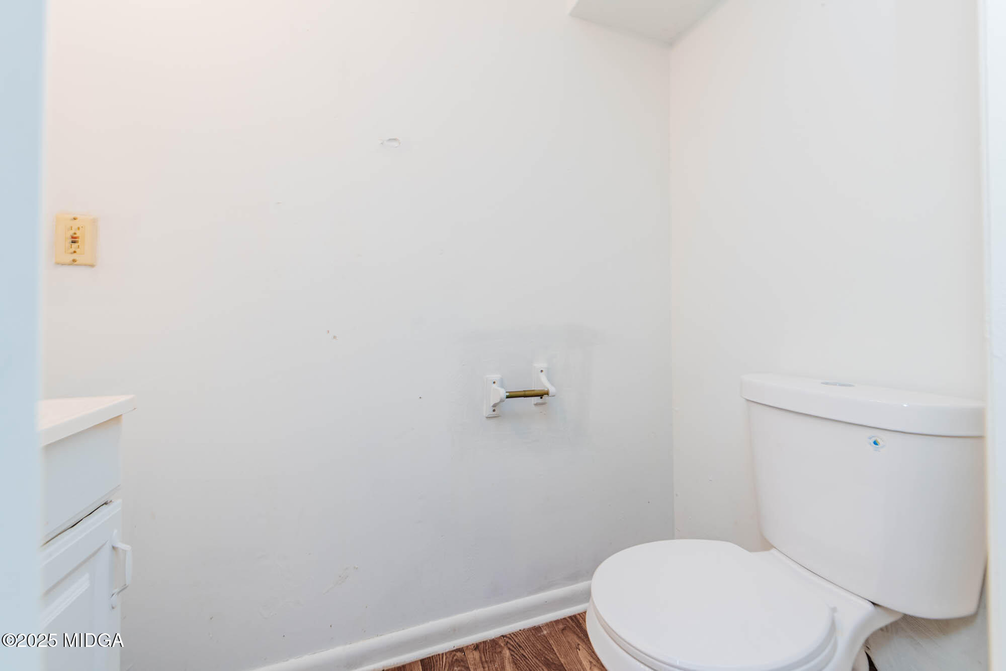 125 Suzanne Drive Warner Robins, GA 31093 - Photo 24 of 50 a white toilet sitting next to a white wall