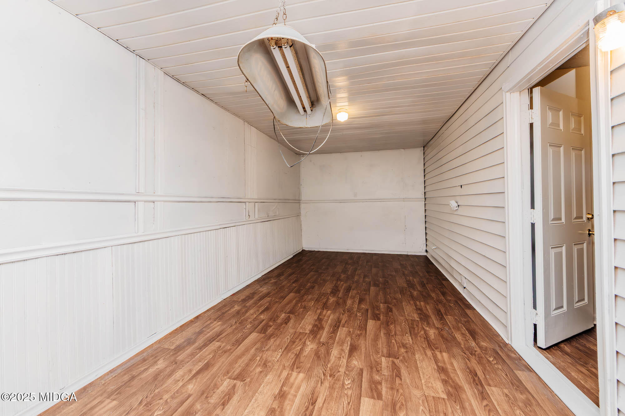 125 Suzanne Drive Warner Robins, GA 31093 - Photo 45 of 50 a view of a room with wooden floor