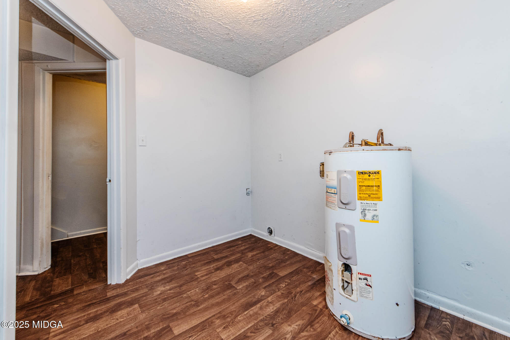 125 Suzanne Drive Warner Robins, GA 31093 - Photo 49 of 50 a view of empty room with wooden floor