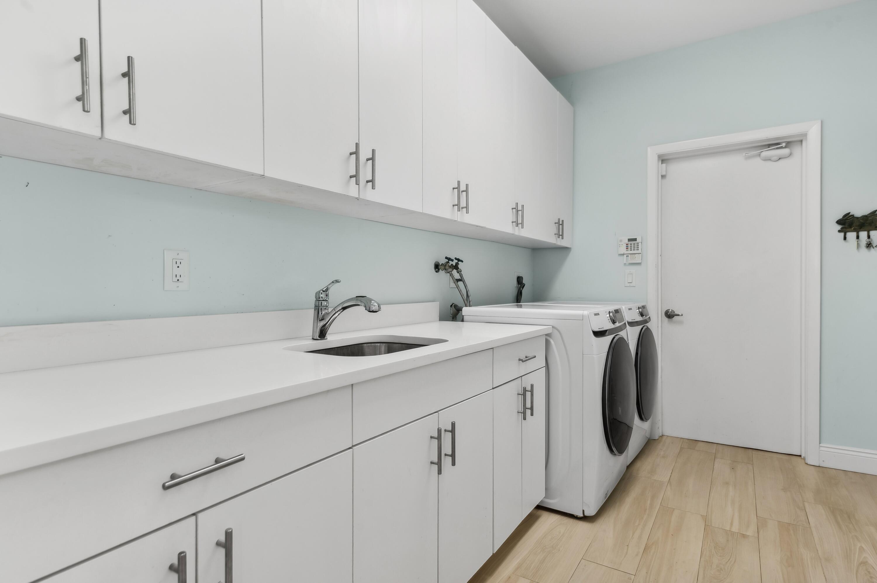 17296 Northway Circle Boca Raton, FL 33496 - Photo 18 of 20 20_17296-Northway-Circle_Laundry-Room_Pr