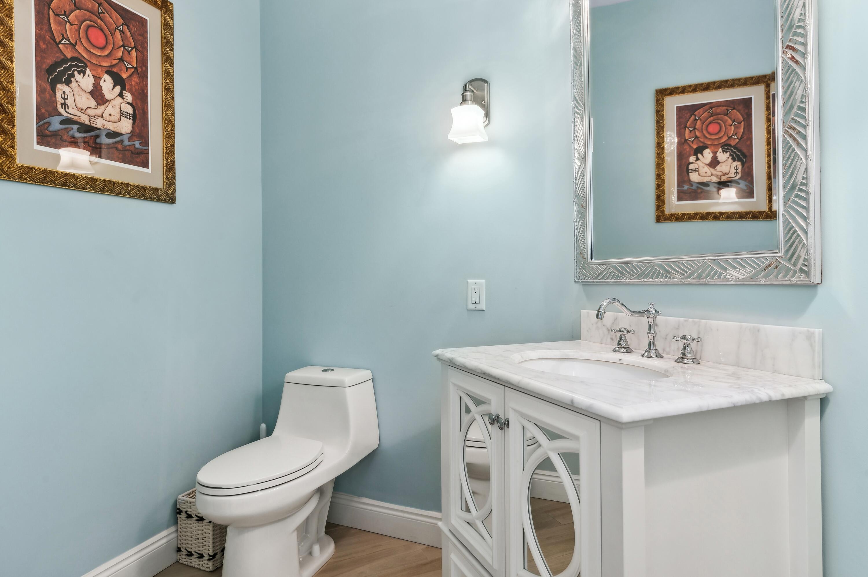 17296 Northway Circle Boca Raton, FL 33496 - Photo 19 of 20 21_17296-Northway-Circle_Powder-Room_Pri