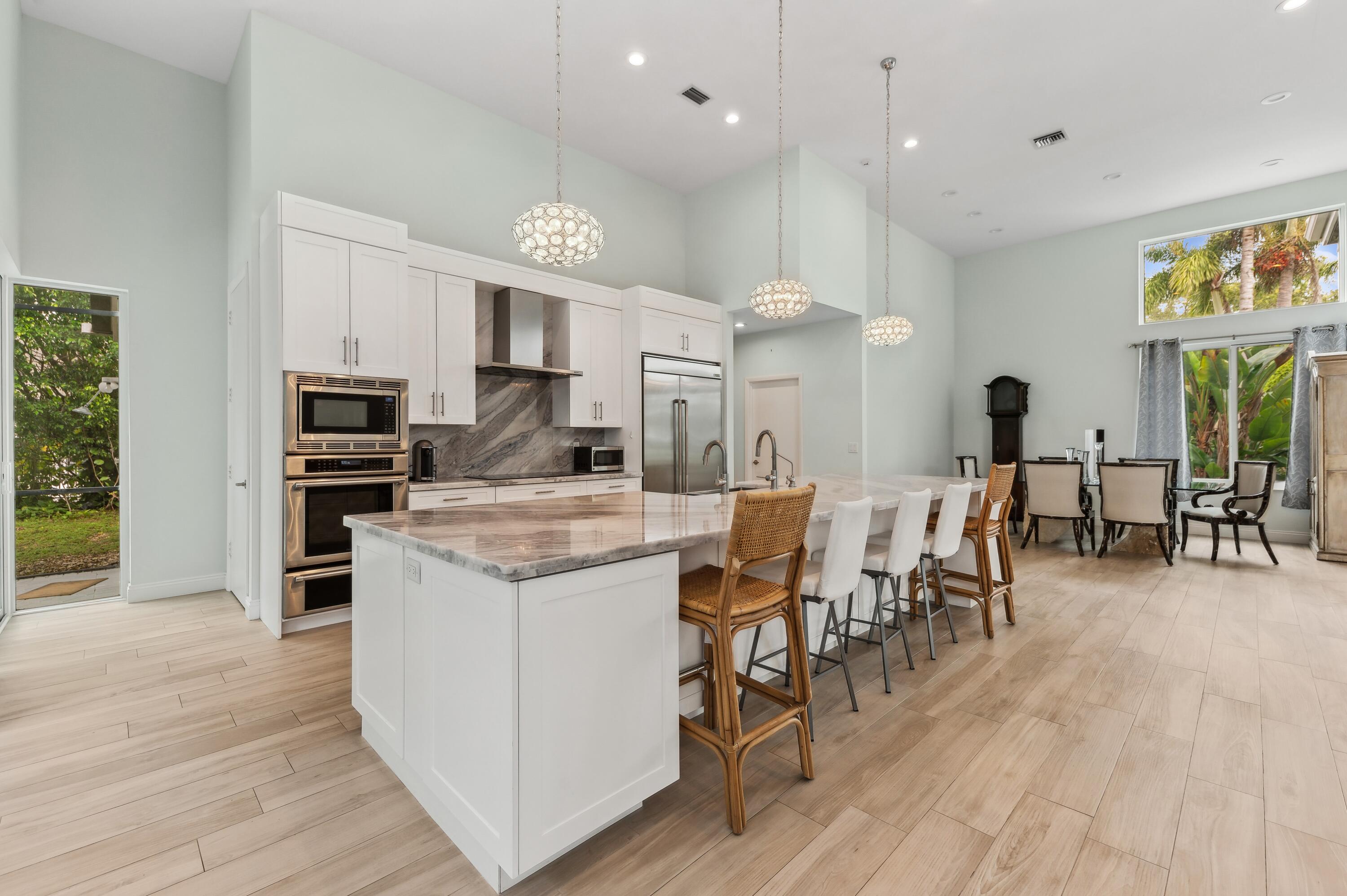 17296 Northway Circle Boca Raton, FL 33496 - Photo 6 of 20 08_17296-Northway-Circle_Kitchen-Dining-