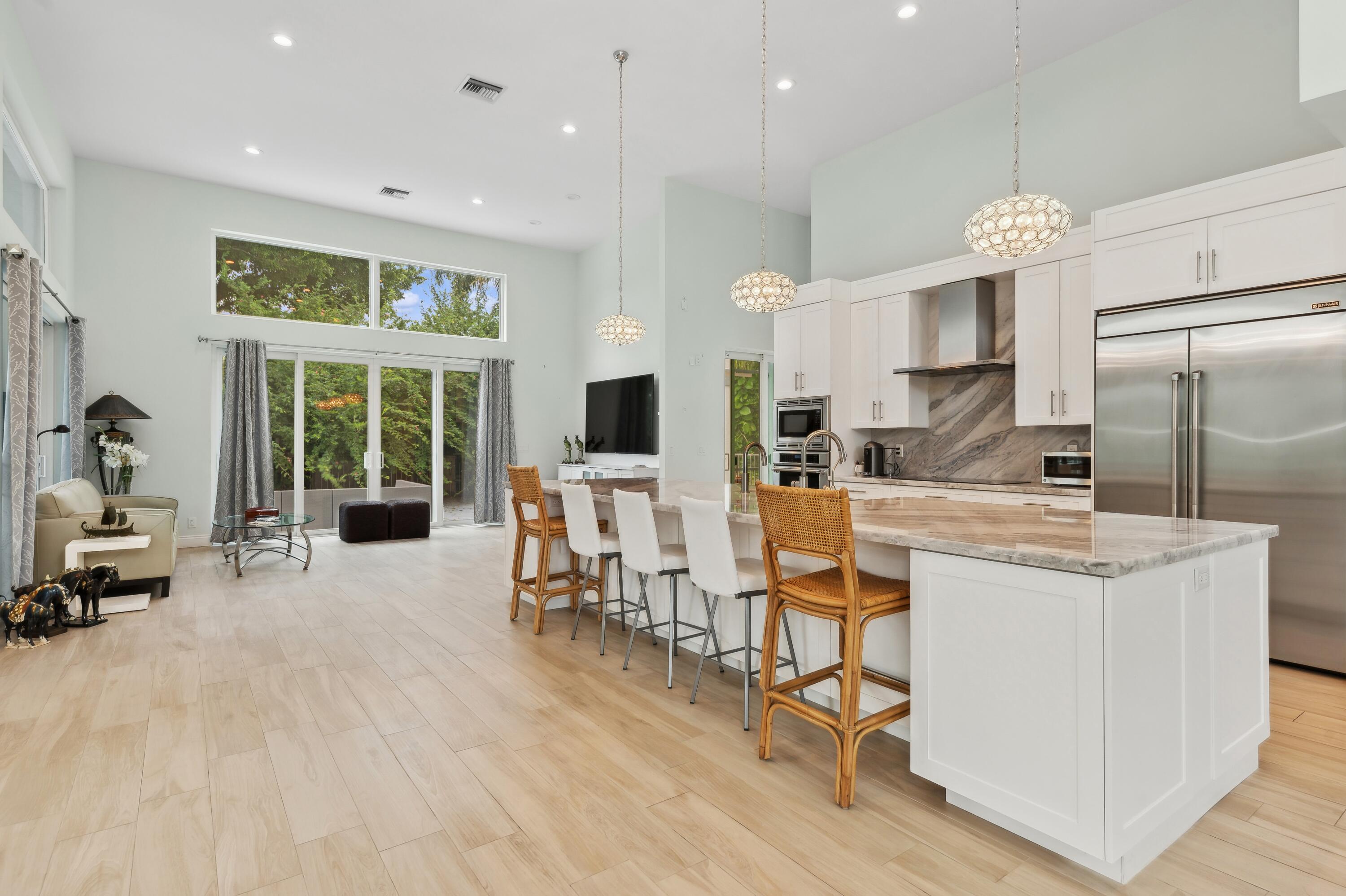 17296 Northway Circle Boca Raton, FL 33496 - Photo 9 of 20 11_17296-Northway-Circle_Family-Room-Kit