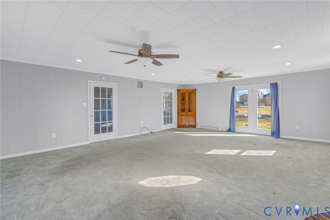 1928 Lake Road Lottsburg, VA 22511 - Photo 6 of 47 a view of an empty room with a window