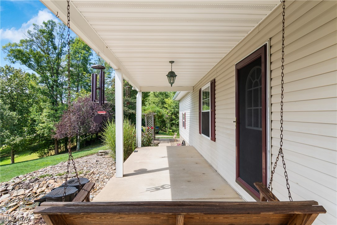 9375 Ridge Road Southeast Uhrichsville, OH 44683 - Photo 6 of 44 Front porch