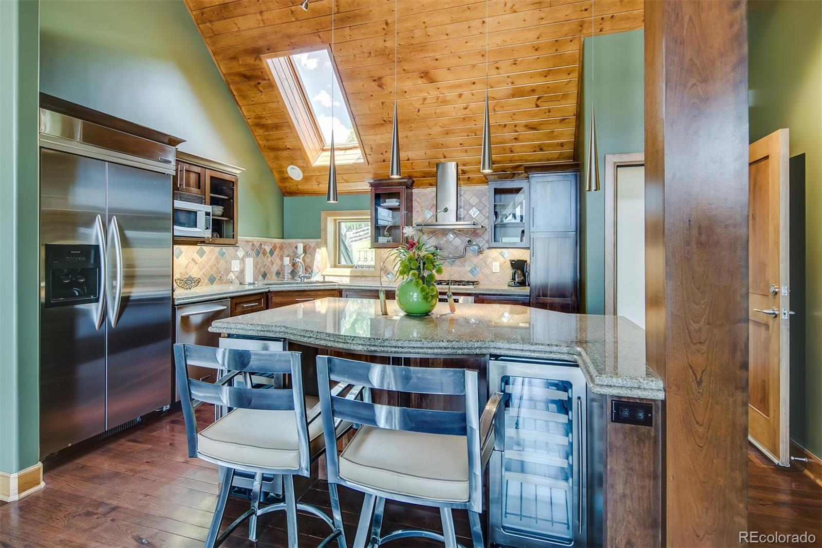6917 Timbers Drive Evergreen, CO 80439 - Photo 27 of 39 a dining room with furniture and window