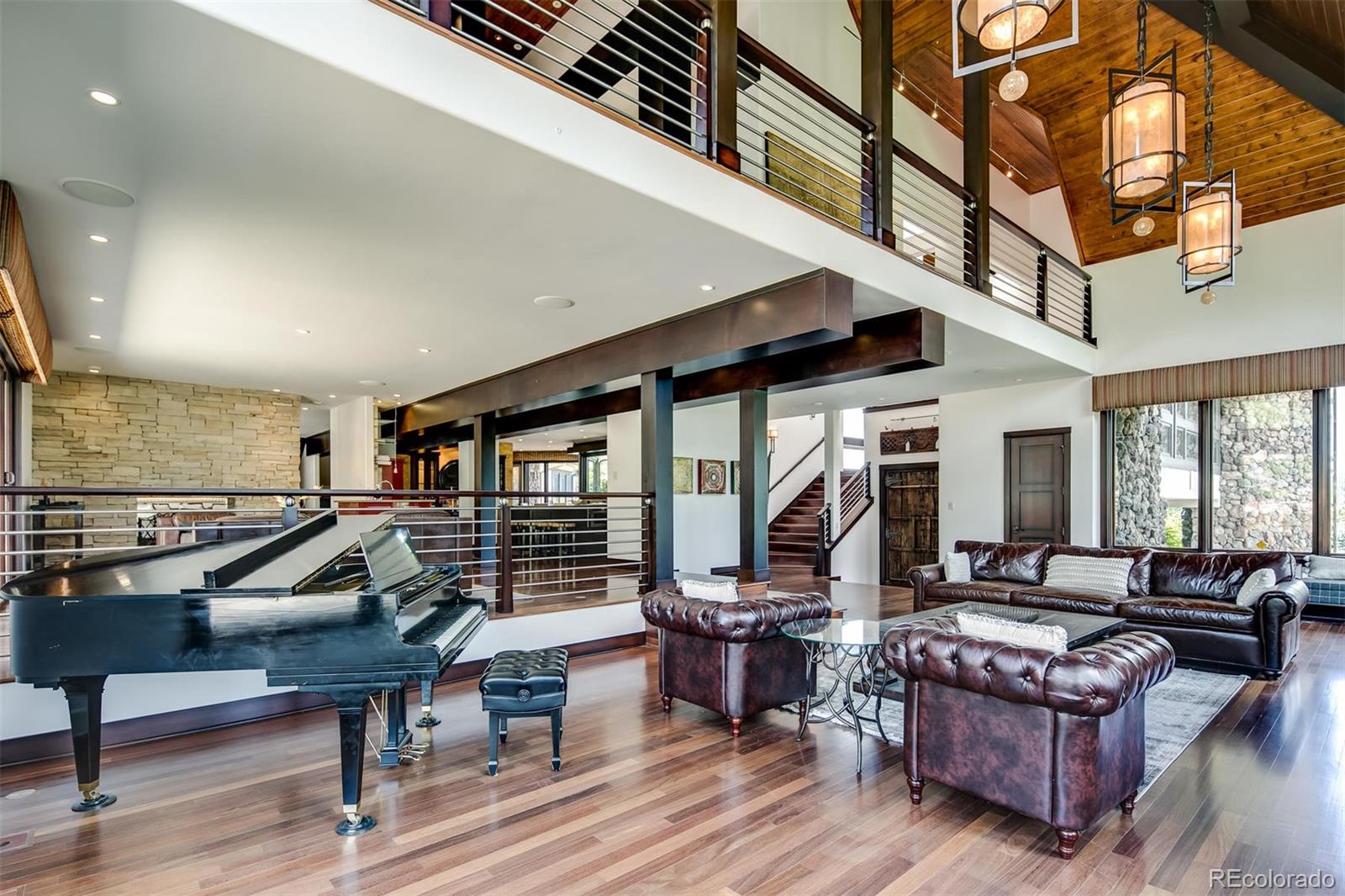 6917 Timbers Drive Evergreen, CO 80439 - Photo 6 of 39 a living room with furniture