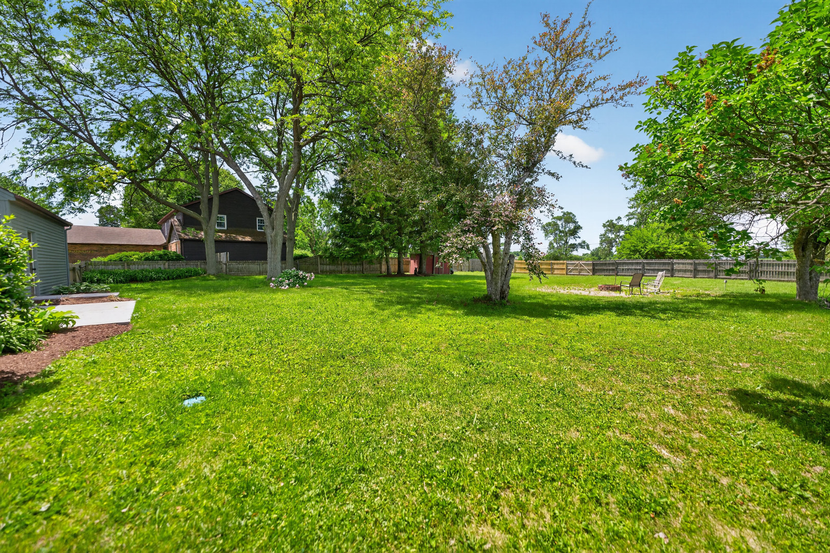 9 Jennifer Lane DeKalb, IL 60115 - Photo 12 of 16 a view of a park with large trees