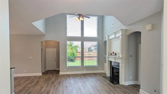 a view of a livingroom with a kitchen