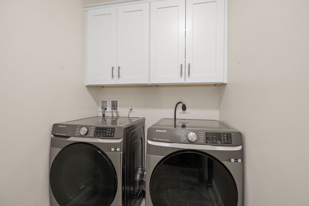 23 Starboard Drive, Unit 50 Wareham, MA 02532 - Photo 11 of 42 a utility room with dryer and washer