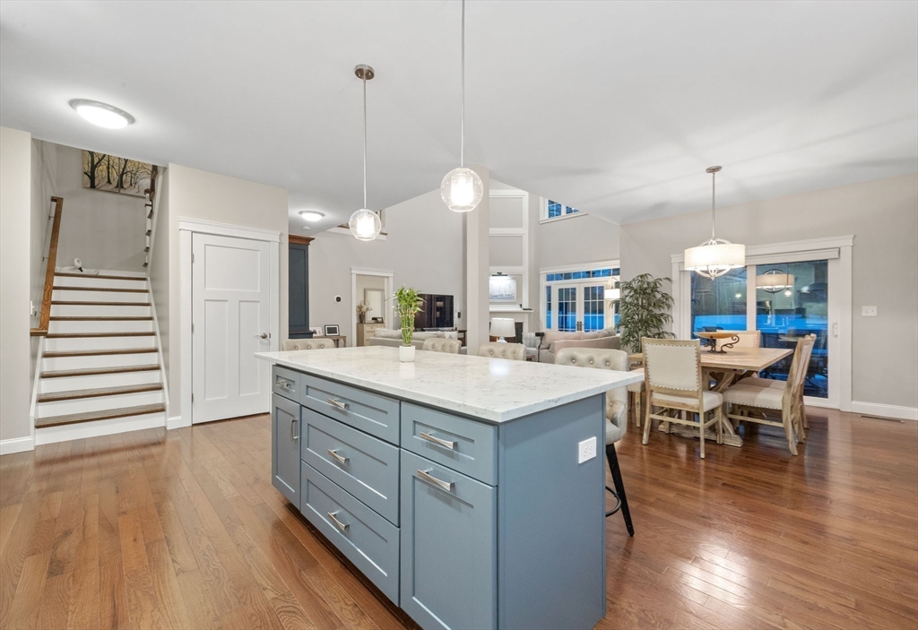 23 Starboard Drive, Unit 50 Wareham, MA 02532 - Photo 16 of 42 a kitchen with a sink a counter space appliances and wooden floor