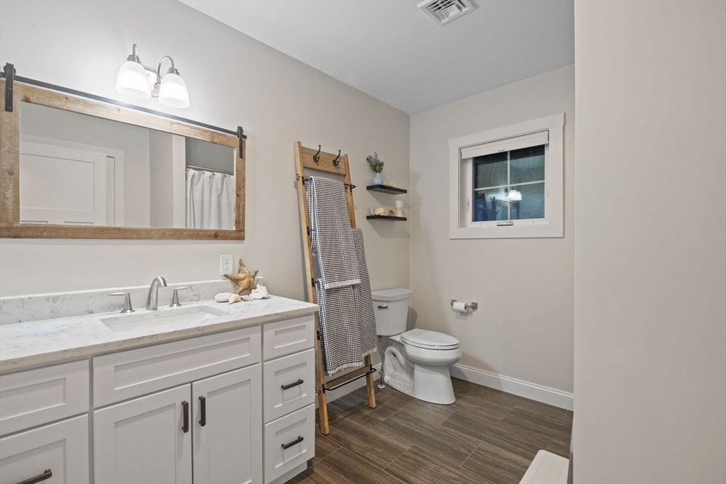 23 Starboard Drive, Unit 50 Wareham, MA 02532 - Photo 28 of 42 a bathroom with a sink toilet and shower