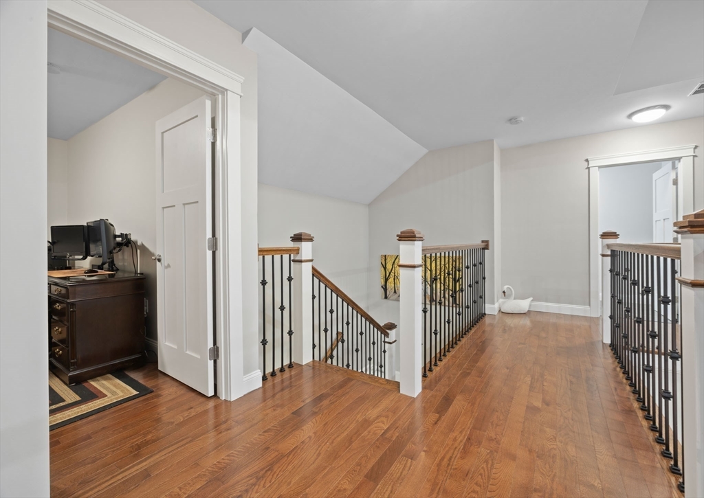 23 Starboard Drive, Unit 50 Wareham, MA 02532 - Photo 32 of 42 a view of a hallway with wooden floor and stairs