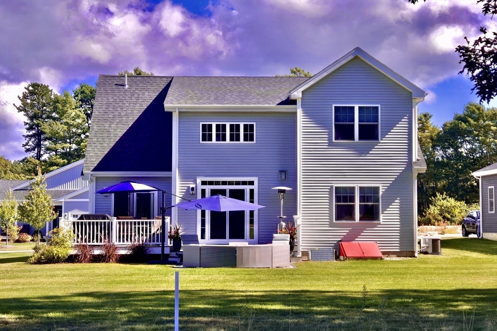 23 Starboard Drive, Unit 50 Wareham, MA 02532 - Photo 34 of 42 a view of a house with a swimming pool