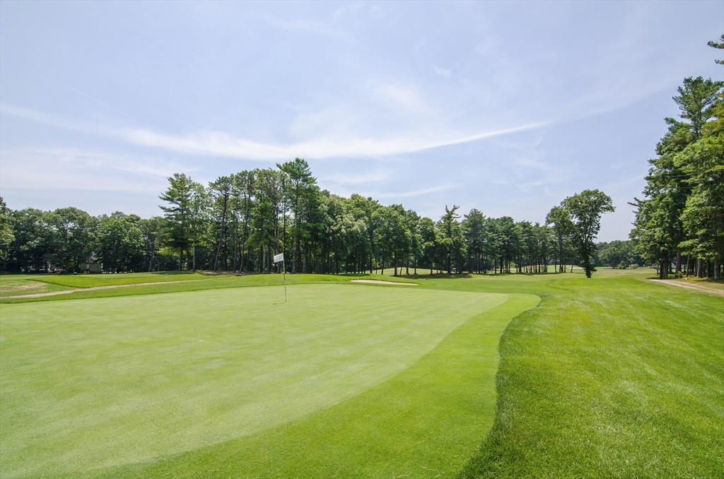 23 Starboard Drive, Unit 50 Wareham, MA 02532 - Photo 41 of 42 a view of a big yard with a large trees
