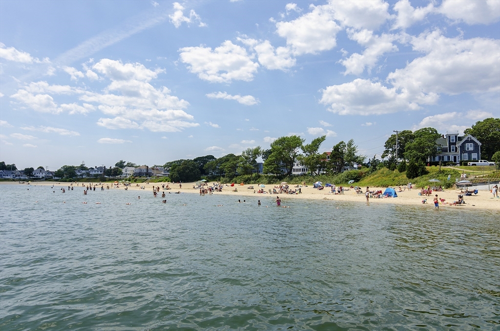 23 Starboard Drive, Unit 50 Wareham, MA 02532 - Photo 42 of 42 a view of a lake with houses in the back