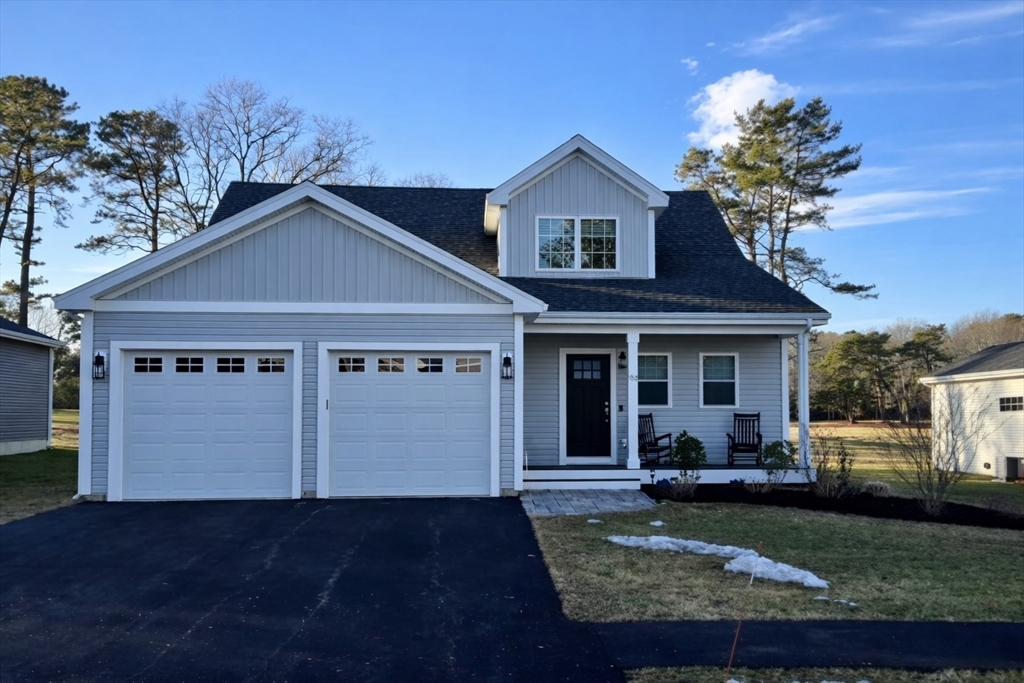 23 Starboard Drive, Unit 50 Wareham, MA 02532 - Photo 6 of 42 a front view of a house with garden