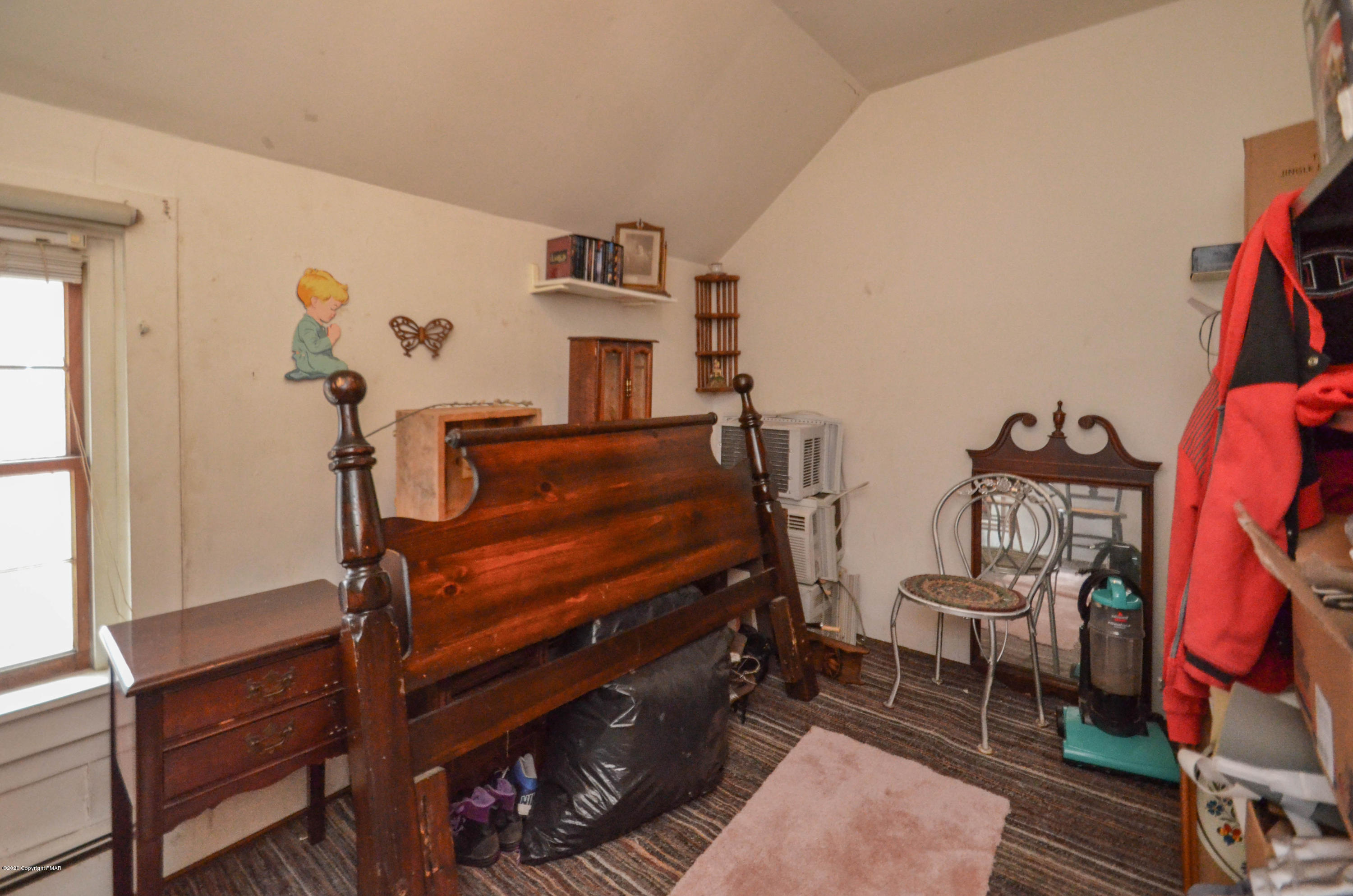 5898 191st Route Cresco, PA 18326 - Photo 8 of 11 a bedroom with furniture and a window