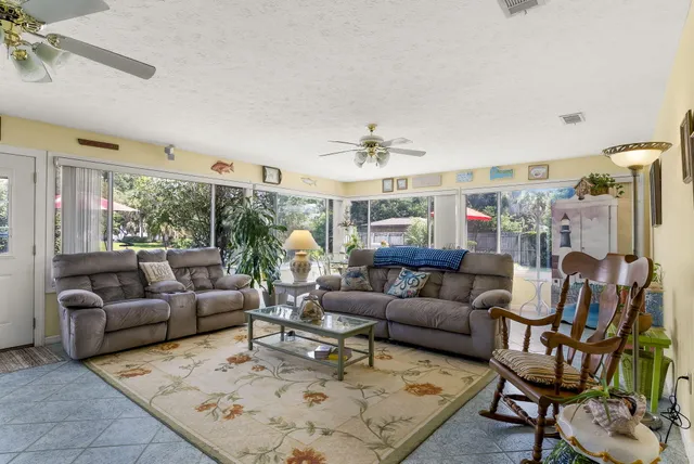 a living room with furniture and a couch