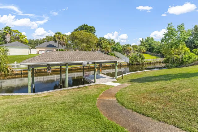 a view of a swimming pool with a patio