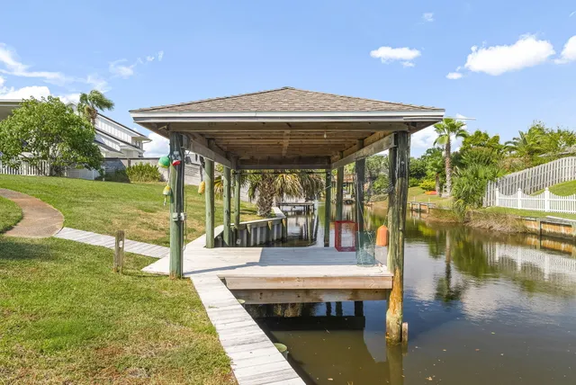 a view of swimming pool with outdoor seating