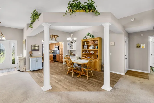 a dining room with furniture and a livingroom