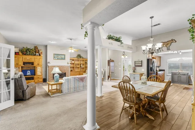 a view of a livingroom and dining room