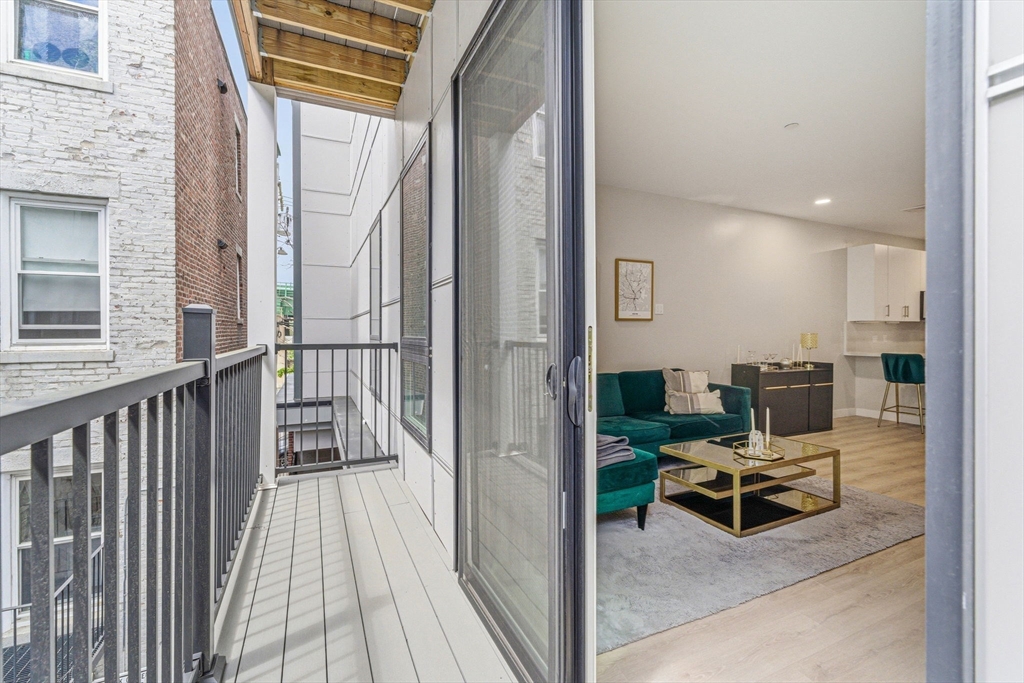 157 Chestnut Street, Unit 203 Chelsea, MA 02150 - Photo 11 of 31 a view of balcony and patio