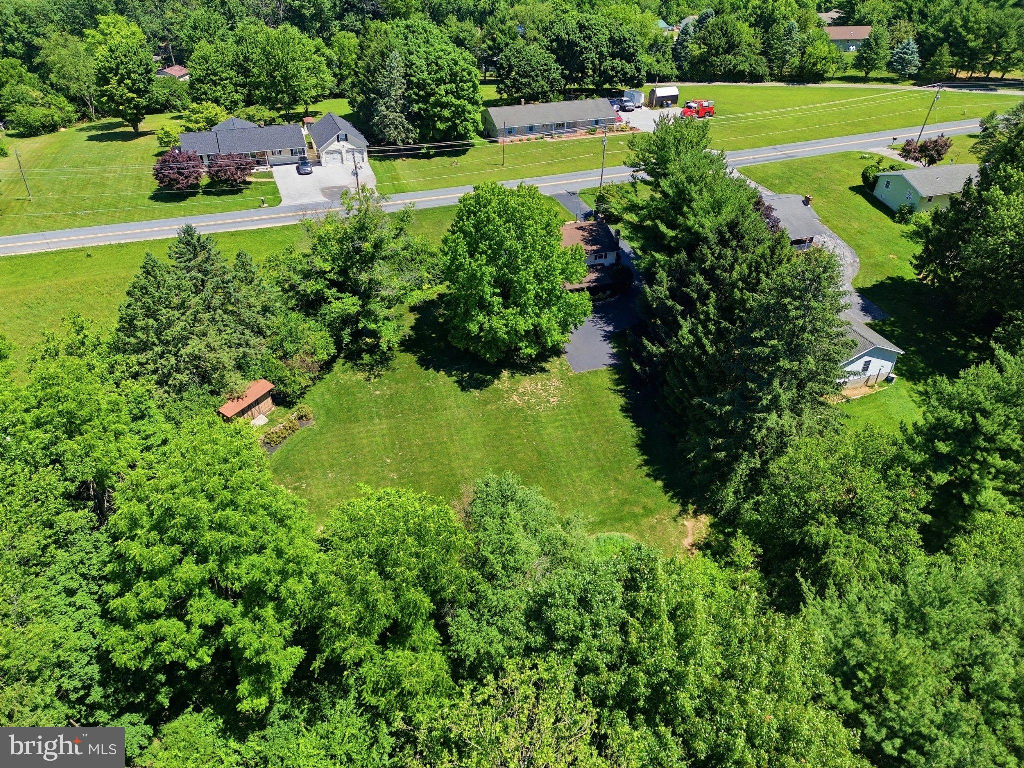 2381 Ridge Road Glenville, PA 17329 - Photo 53 of 58 Lush greenery surrounds a serene home.